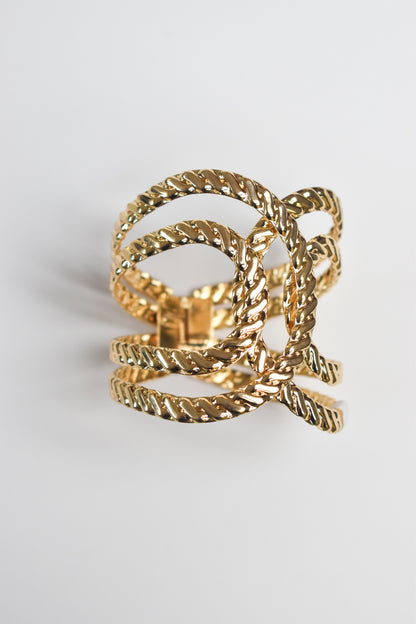 Brazalete cruzado